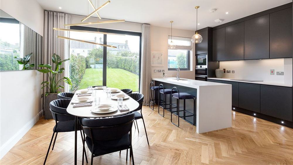 Handless Door Style Kitchen with Solid Surface Countertops